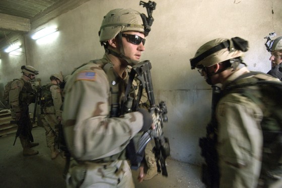 U.S. Army 1st Battalion, 24th Infantry Regiment soldiers search for insurgents in Mosul on Monday.