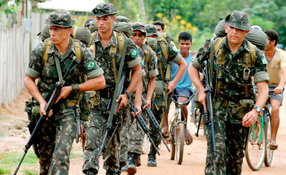 Brazilian soldiers arrive Thursday in Anapu after a U.S. nun, Sister Dorothy Stang, was shot to death last weekend.