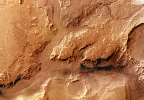 Reull Vallis is an outflow channel that extends 1500 kilometers across Promethei Terra in the direction of Hellas Basin. Mars Express took this image on May 29, 2004.