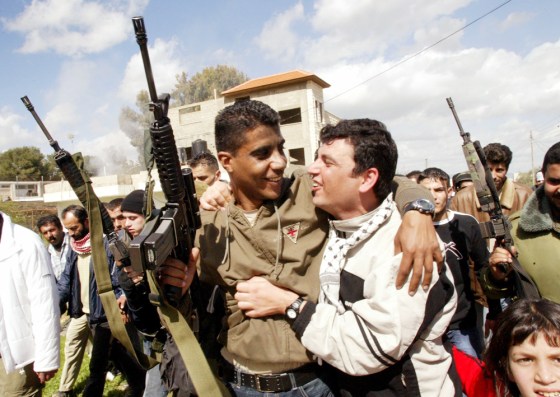 Commander of the militant Al Aqsa Martyrs Brigades, Zakaria Zubaidi greets the released Palestinian prisoners