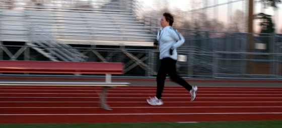 Before each workout, I start with a warm-up mile. No, I did not run into the bench but I did want to sit down on it.