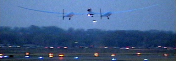 The Virgin Atlantic GlobalFlyer rises into the darkening sky over Salina, Kan., on Monday.
