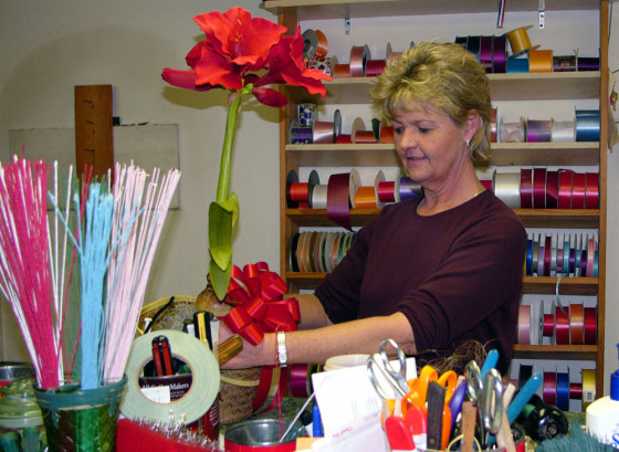 Sharon Webb, owner of The Flower Shop in Nashville, Ga., supplied more than 90 wreaths and other floral items for funerals last month.