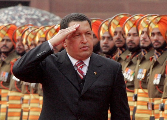 Venezuela's President Hugo Chavez inspects an honour guard during his ceremonial welcome at the presidential palace in New Delhi