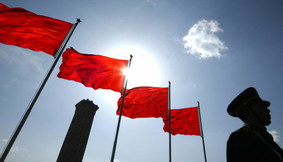 A Chinese policeman stands guard at Tiananmen Square in Beijing