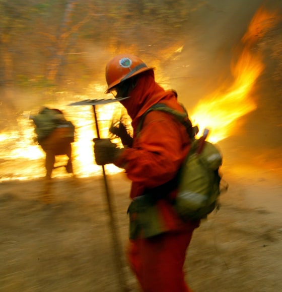 Firefighters are preparing for a nasty fire season likely to feature scenes like this one from a July 18, 2004, blaze near Santa Clarita, Calif.