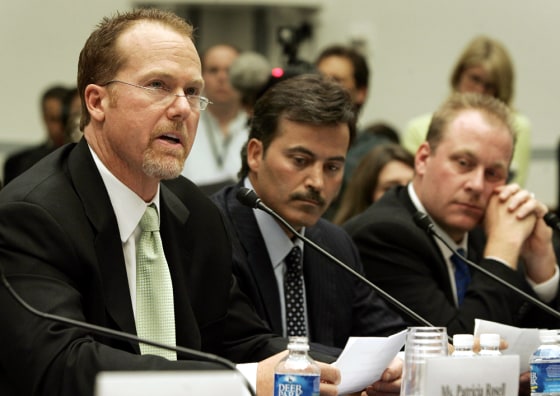 Former St Louis Cardinals batter Mark McGwire makes a statement during testimony at a hearing on Capitol Hill