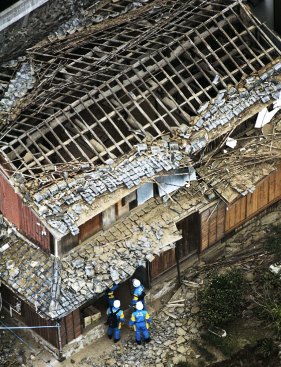 RESCUE WORKERS COLLAPSED HOUSE ON GENKAI ISLAND