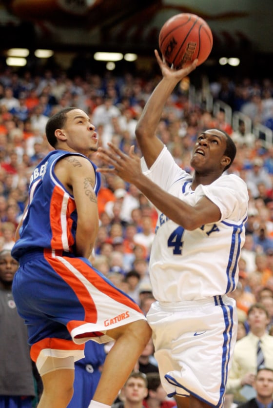 Kentucky Rondo shoots over Florida Roberson during SEC tournament final in Atlanta
