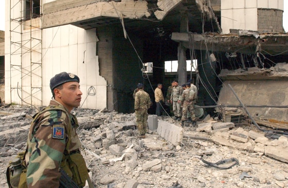 Soldiers stand guard at the wrecked Alta Vista Shopping Center, in the Kaslik stretch near Jounieh, north of Beirut, after an explosion tore through the structure in Lebanon's Christian heartland, on Wednesday.