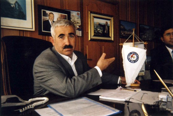 Suleyman Topcu, mayor of Demre, Turkey, points with pride on Monday to the official pendant of the municipality, where the 4th century St. Nicholas lived and died. 