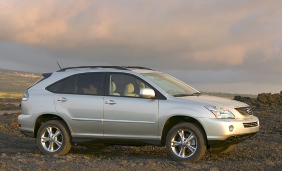Gas-electric hybrids, like the Lexus RX 400h SUV that becomes available next month, will help automakers meet their agreement with Canada to cut greenhouse gas emissions there.