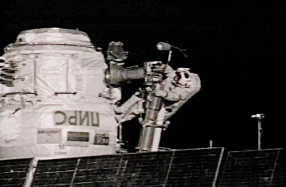 Russian cosmonaut Sharipov works outside the PIRS docking station during his spacewalk aboard the International Space Station