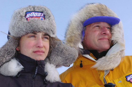 Alicia Hempleman-Adams, 15, stands with her father, David Hempleman-Adams, in the Canadian Arctic after she bettered his time in crossing Baffin Island.