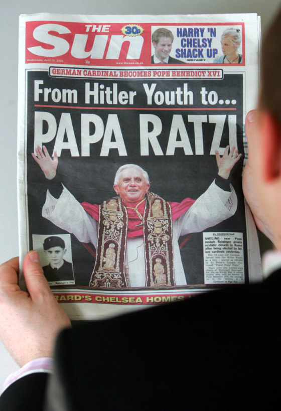 An office worker reads the 20th April ed