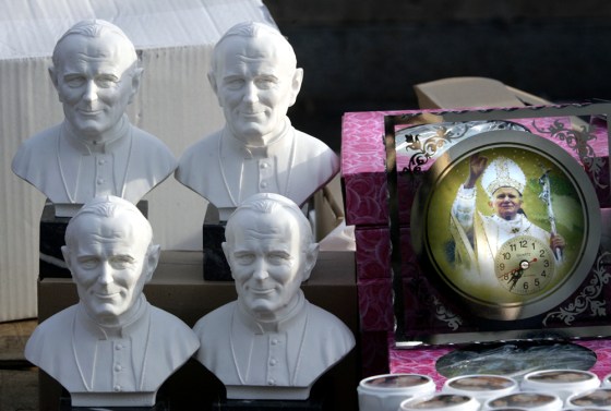 Likenesses of Pope John Paul II are shown at a souvenir stand near the Via della Conciliazione in Rome, the main boulevard to the Vatican, earlier this month.