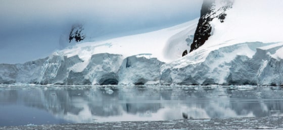 A glacier looms off the coast of the Antarctic Peninsula.