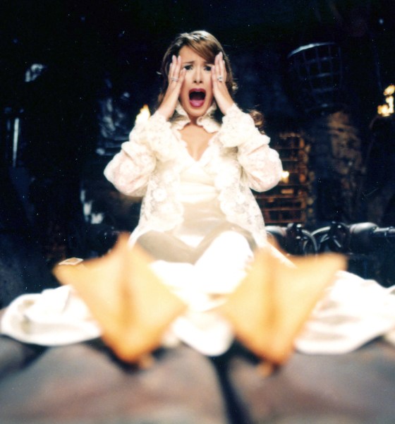 In this photo from Aflac insurance, model Melania Trump discovers she now has duck feet after a mad scientist's experiment went awry, in an upcoming commercial for Aflac insurance. 