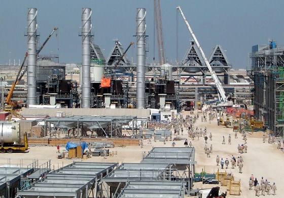 By 2006, this construction site near Doha, Qatar, is expected to be the world's largest plant that converts natural gas to clean diesel.