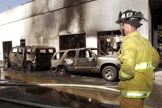 These and other SUVs at a dealership in West Covina, Calif., were destroyed in an August 2003 arson fire. A college student tied to the Earth Liberation Front was sentenced last April to eight years in prison for the crime.