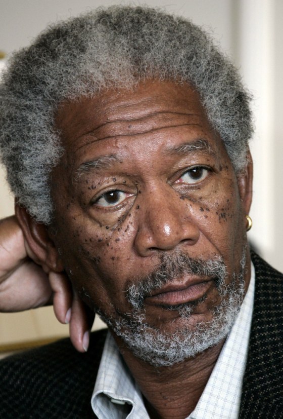 Hollywood actor Freeman listens to questions about piracy at the 58th Cannes Film Festival