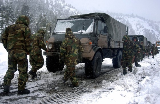 Chilean rescue workers prepare truck near Antuco volvano to search for missing soldiers in Andes, southeast of Santiago