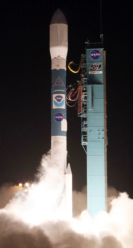 A Boeing Delta 2 rocket with the NOAA-N polar orbiting weather satellite lifts off from Vandenberg Air Force Base