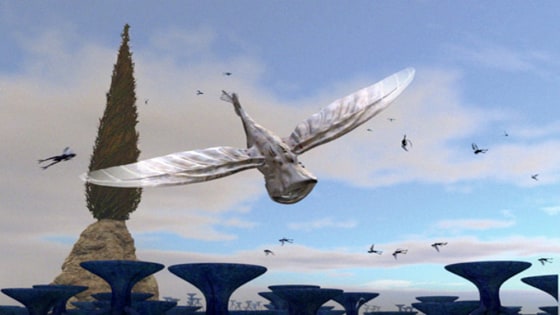 A skywhale is hunted by small, agile predators on Blue Moon, one of two alien worlds developed and populated by computer models.