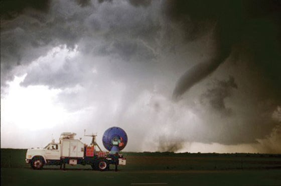 Last year's model of the Center for Severe Weather Research's mobile radar truck eyed dozens of tornadoes in 2004, including this one on May 12 near Attica, Kan. The technology has been upgraded for this year's storms.