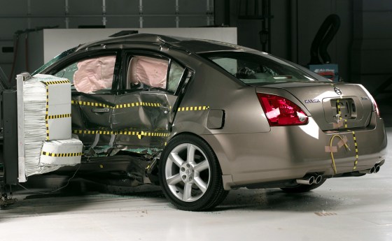 This photo released by the Insurance Institute for Highway Safety shows the damage to a 2005 Nissan Massima after a crash to determine how well the vehicle would protect occupants in side impact collisions. 