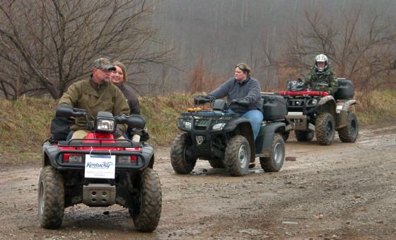 A group of ATV riders drive along an old mining road on a mountainside near Evarts, Ky., earlier this year. The increasing popularity of the four-wheelers has meant more accidents, in particular among youngsters. Children under 16 accounted for about a third of the nearly 6,000 ATV deaths reported since 1982, according to a safety group.