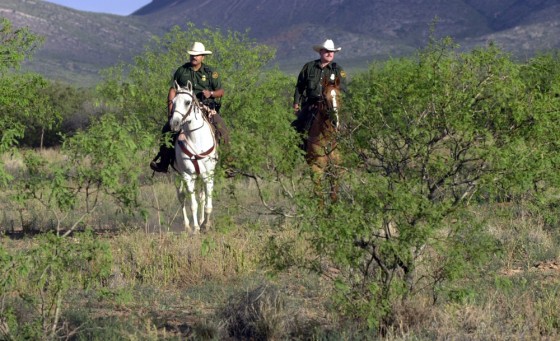 Border Patrol officers start their patrol near Naco, Ariz., an area with a unique habitat that is being protected with a special feed given to horses.