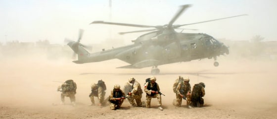 British military helicopter lands during an operation in central Basra