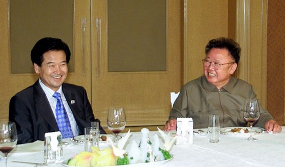 North Korean leader Kim chats with South Korea's Unification Minister Chung during their meeting in Pyongyang