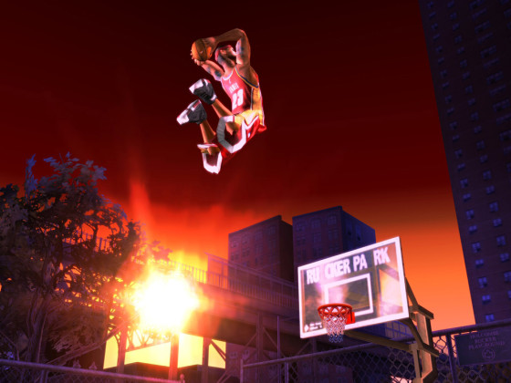 "LeBron James" performs a high-flying dunk in this screenshot from the Electronic Arts video game "NBA Street V3."