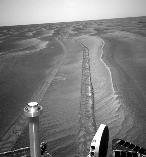 As shown in this backward-looking image, NASA's Opportunity rover is staying between the lines — or in this case, dune crests — as it makes its way south toward Erebus crater.