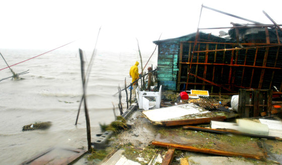 Antonio SanMartin checks on his storage shed Wednesday at La Carbonera after Hurricane Emily hit the northern State of Tamaulipas, Mexico. Emily has since been downgraded to a tropical storm.