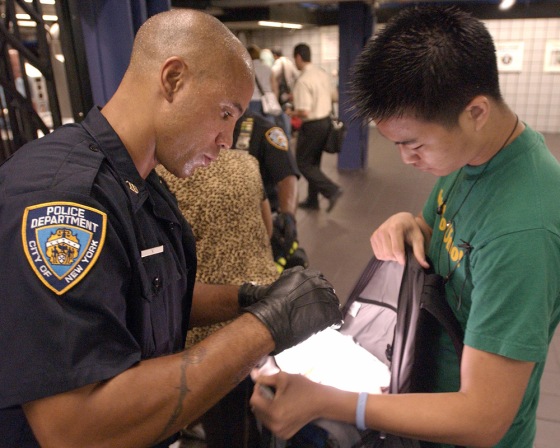 Police officers patrol the 42nd Street Port Authority subway station in New York