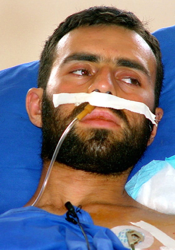 Vladimir Arutyunian, seen in a hospital in Tbilisi, Georgia, on Thursday, reportedly admitted throwing a live grenade at a rally in May where President Bush was making a speech.