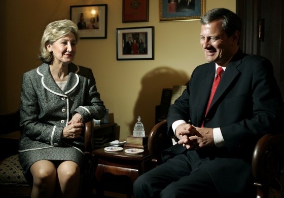 Supreme Court nominee John Roberts meets with Sen. Kay Bailey Hutchison, R-Texas., on Tuesday in her office on Capitol Hill.