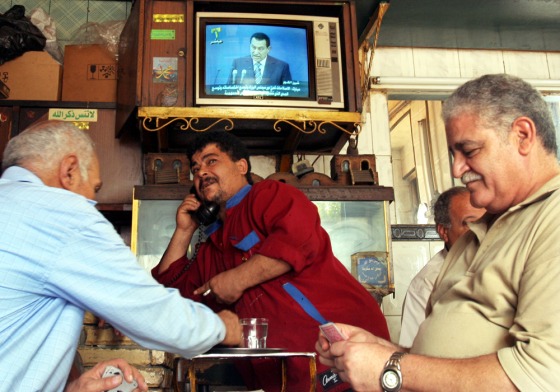 Egyptians play cards in Cairo as they watch President Hosni Mubarak announce his candidacy for a fifth term on television, on Thursday.