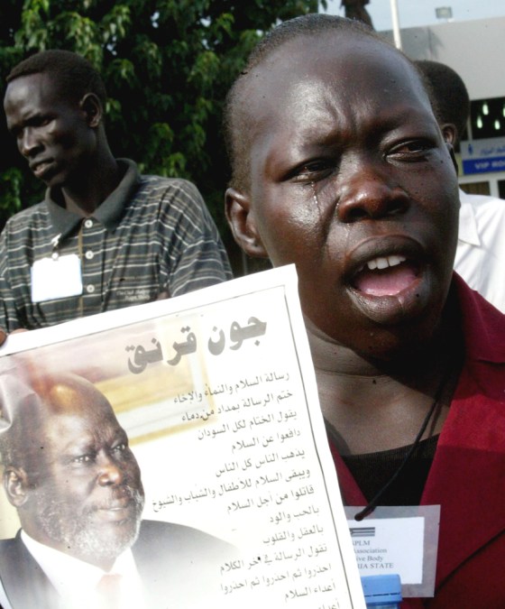 Grief-stricken Sudanese bury ex-rebel leader