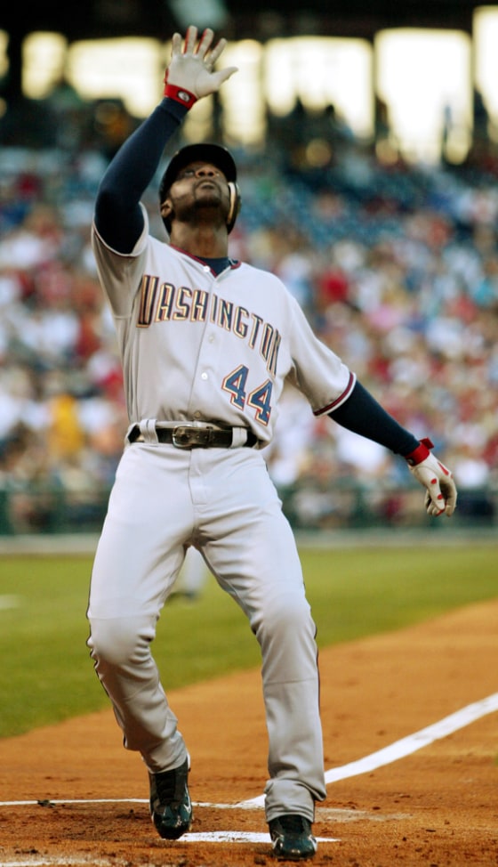 Washington Nationals Preston Wilson celebrates his first two run home run against the Phillies