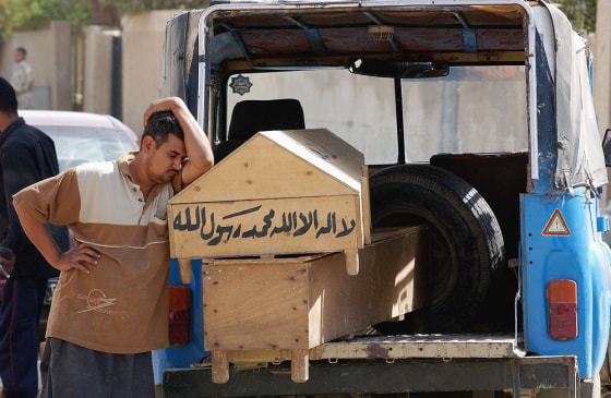 Scores Killed, Wounded In Baghdad Triple Bombing