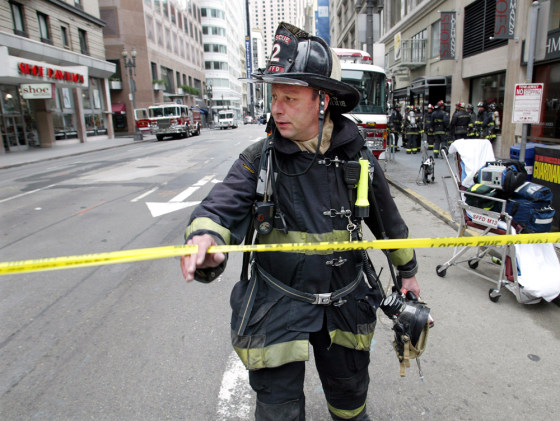 San Francisco firefighter crosses a police line in downtown San Francisco