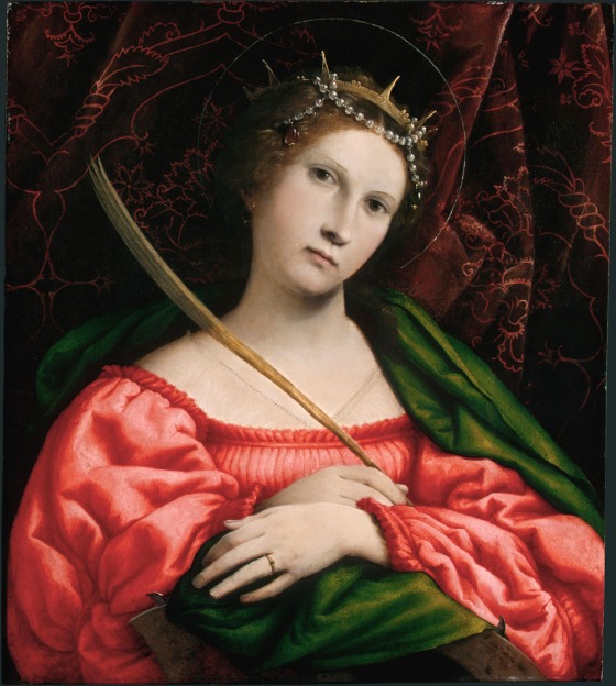 Venetian artist Lorenzo Lotto's "Saint Catherine." A senior conservation scientist at the National Gallery of Art discovered artists had mixed tiny bits of glass with their pigments, which enhanced the glint of the colors.