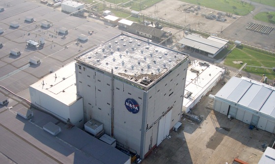 An aerial photograph shows damage to the roof of the Vehicle Assembly Building at NASA's Michoud Assembly Facility in New Orleans. The shuttle fuel tanks at the facility are undamaged, NASA says, but it will be weeks before workers can return.