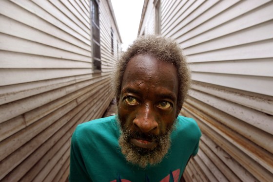 Hurricane Katrina holdout Joshua Creek looks the height of the floodwaters in his house in New Orleans