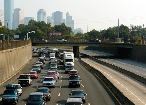 With the downtown skyine in the backgrou