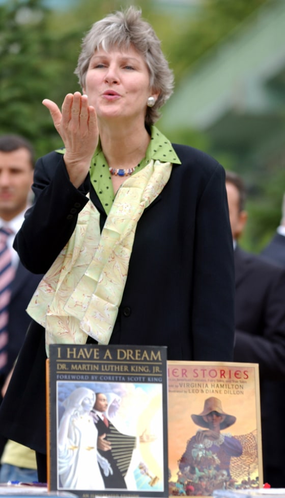 United States Undersecretary of State for public diplomacy and public affairs Karen Hughes blows a kiss to Turkish children in Istanbul